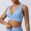 S85f5a746a97445bba653aab29c68ec44A.webp Cross Strap Sports Bra with Padding for High-Intensity Workouts