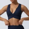 S88512f50de8244eca45a81e5a8eb734ba-2.webp Cross Strap Sports Bra with Padding for High-Intensity Workouts
